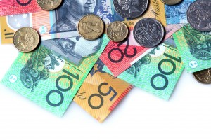 Australian money ~ notes and coins ~ on white background.